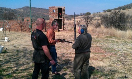 Mr. Olivier and Mr. van Zyl at the range with Joe